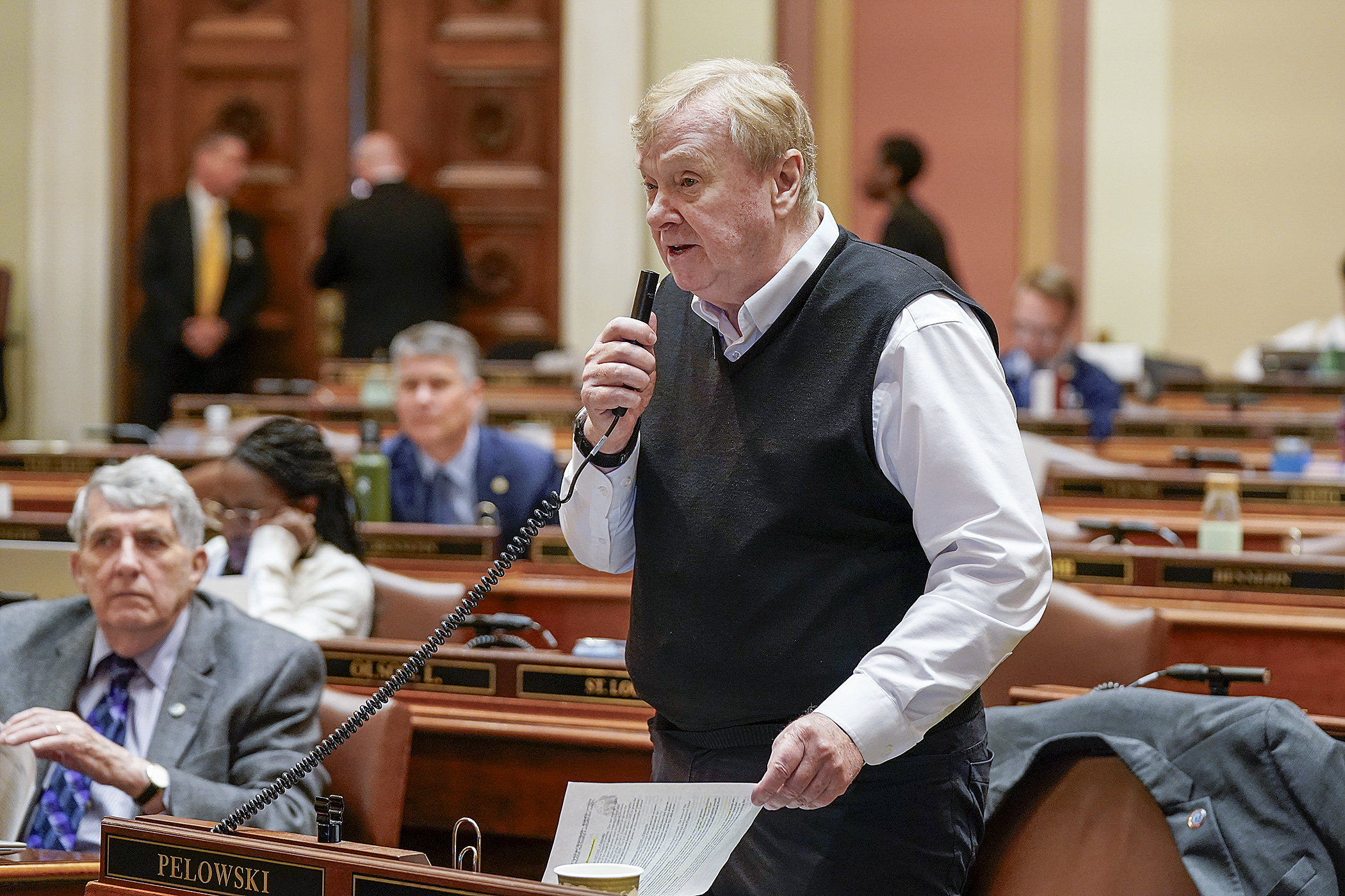 Rep. Gene Pelowski, Jr. introduces HF5299, the House higher education supplemental budget bill, on the House Floor May 3. After being tabled last week, the bill was passed Tuesday. (Photo by Michele Jokinen)